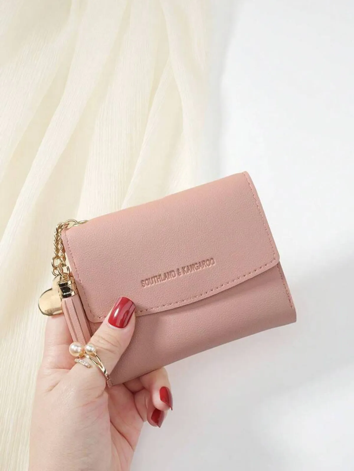 Pink woman purse.