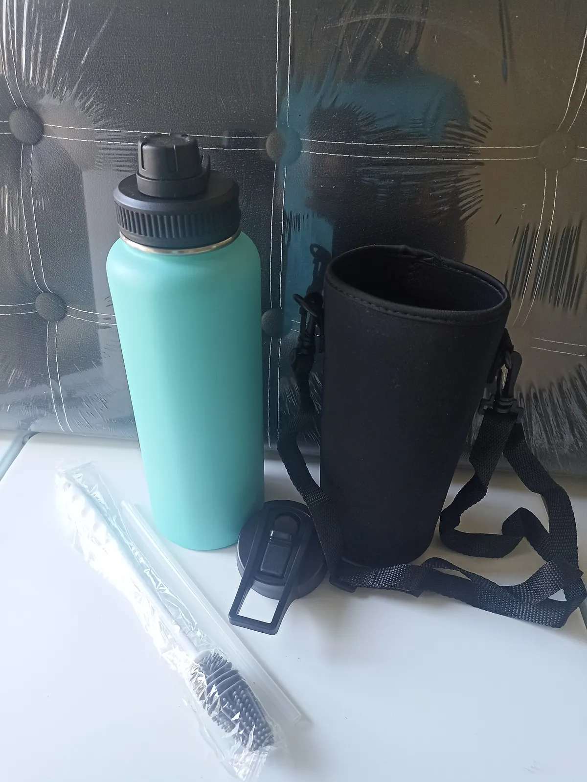 40oz Asst colour Stainless steel Water Bottle with Pouch, Extra lid, Straw and a bottle brush., Wolmer's Blue