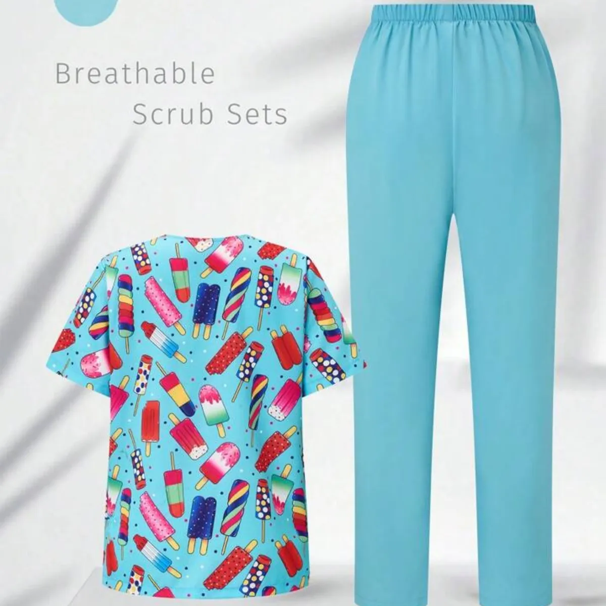 TaskFit V-Neck Cartoon Printed Short Sleeve Top With Pocket And Solid Color Pants - Size: L