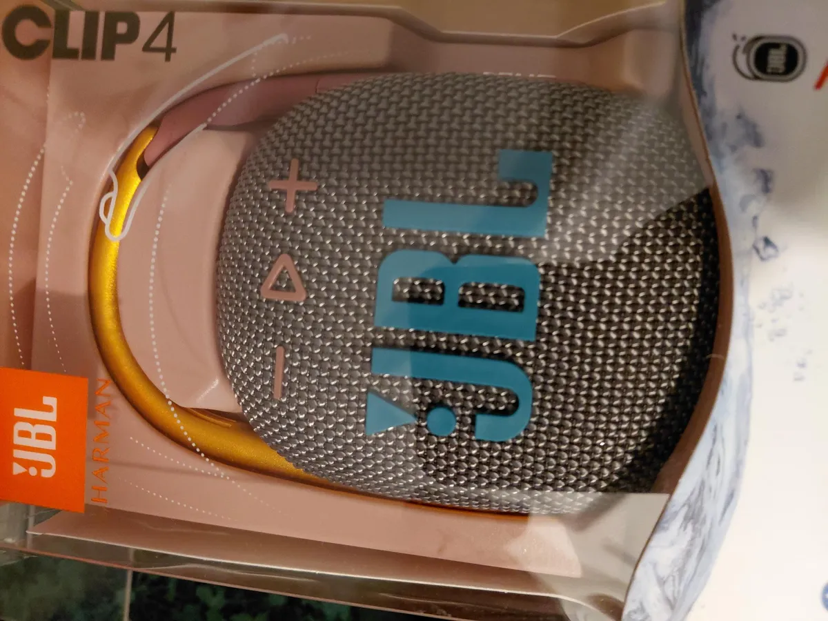 JBL Clip 4 - Premium Sound Portable Mini Bluetooth Speaker,IP67 waterproof and dustproof, 10 hours playtime (Grey)