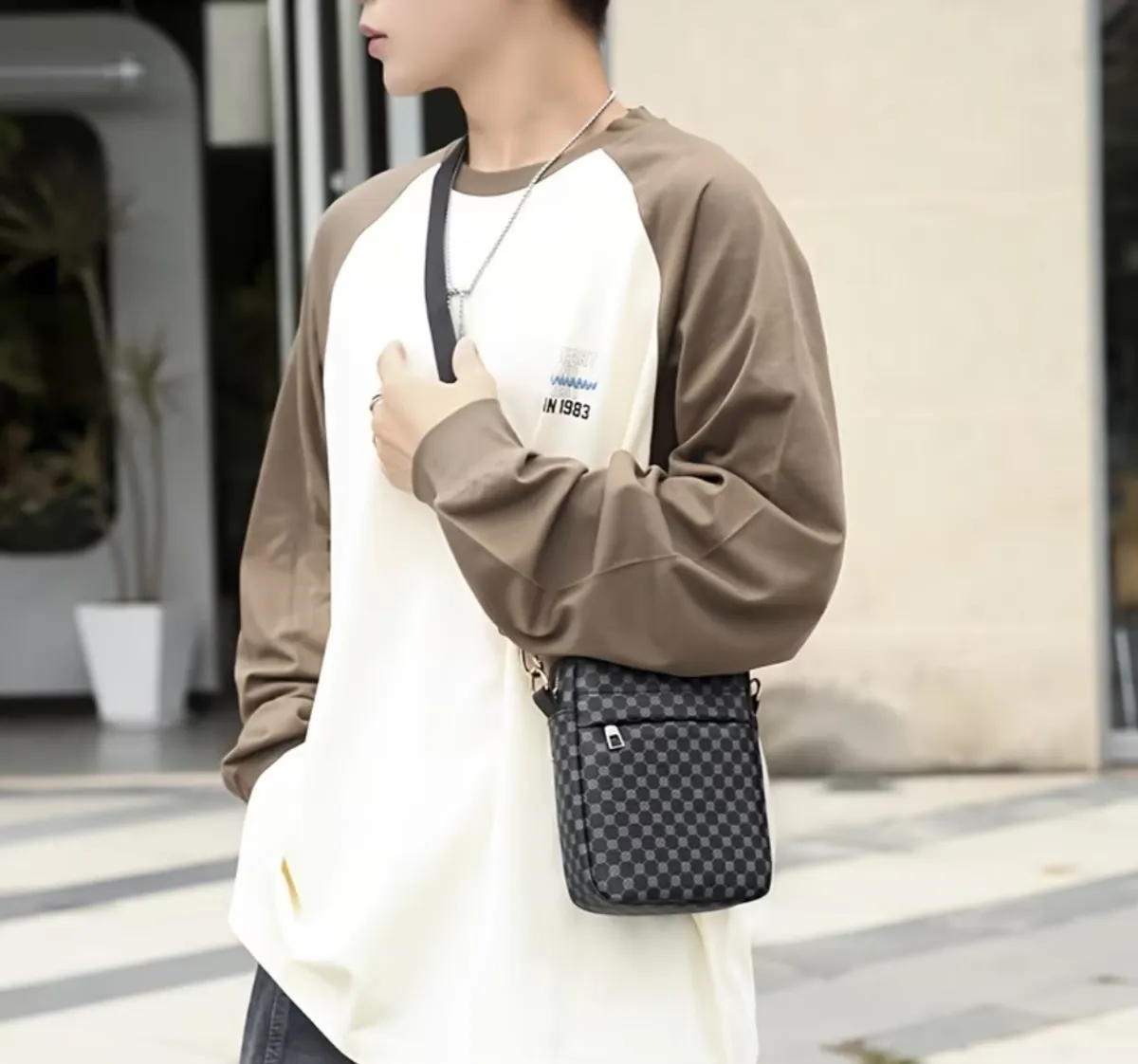 A Black PU Messenger Bag, Printed Commuter Bag, Crossbody Bag, and Unisex Shoulder Bag